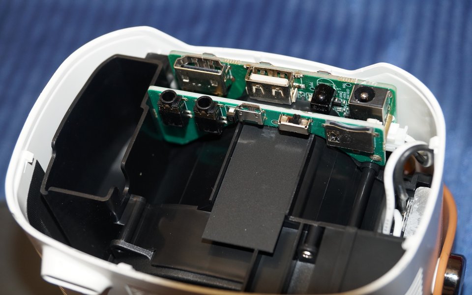 Projector rear panel with HDMI, USB and power ports