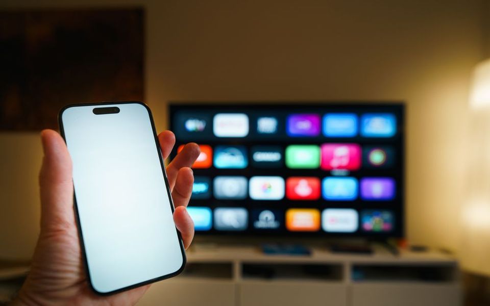 Smart TV showing its home screen in a living room